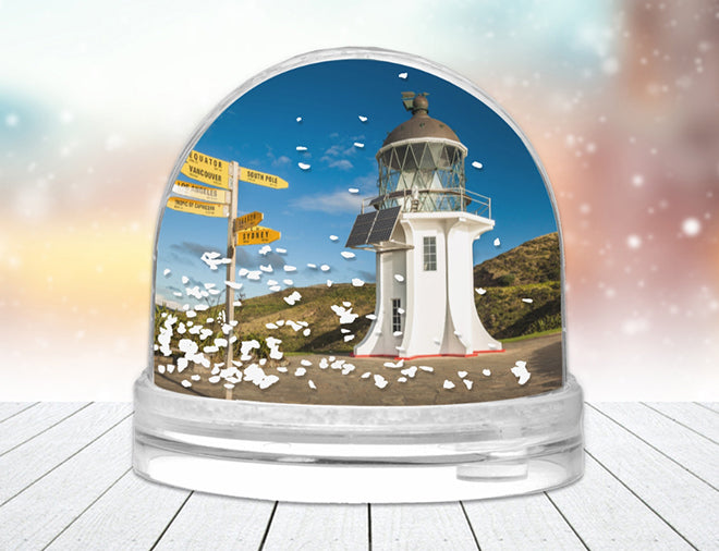 A personalised Photo Snow Globe with a picture of a girl and snow raining down