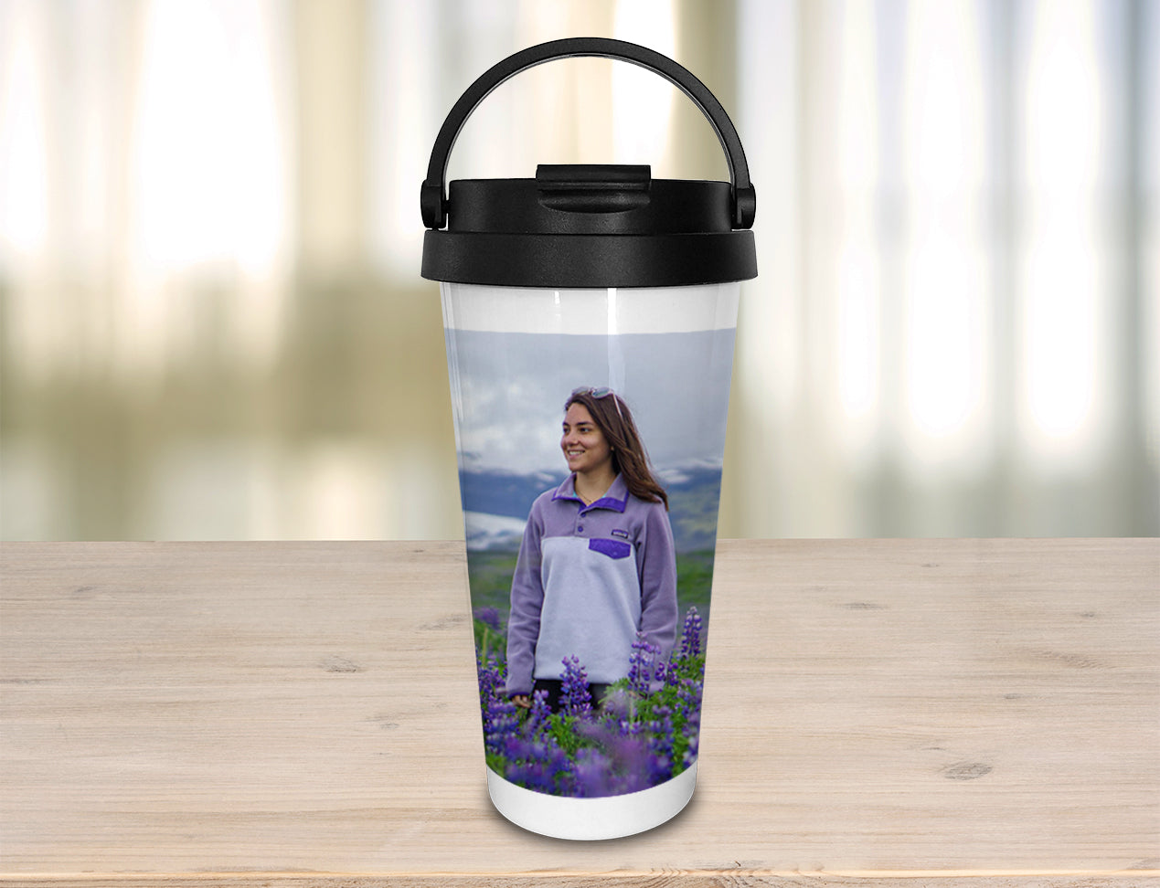 tall custom travel mug, personalised with photo and closed with lid and handle to carry