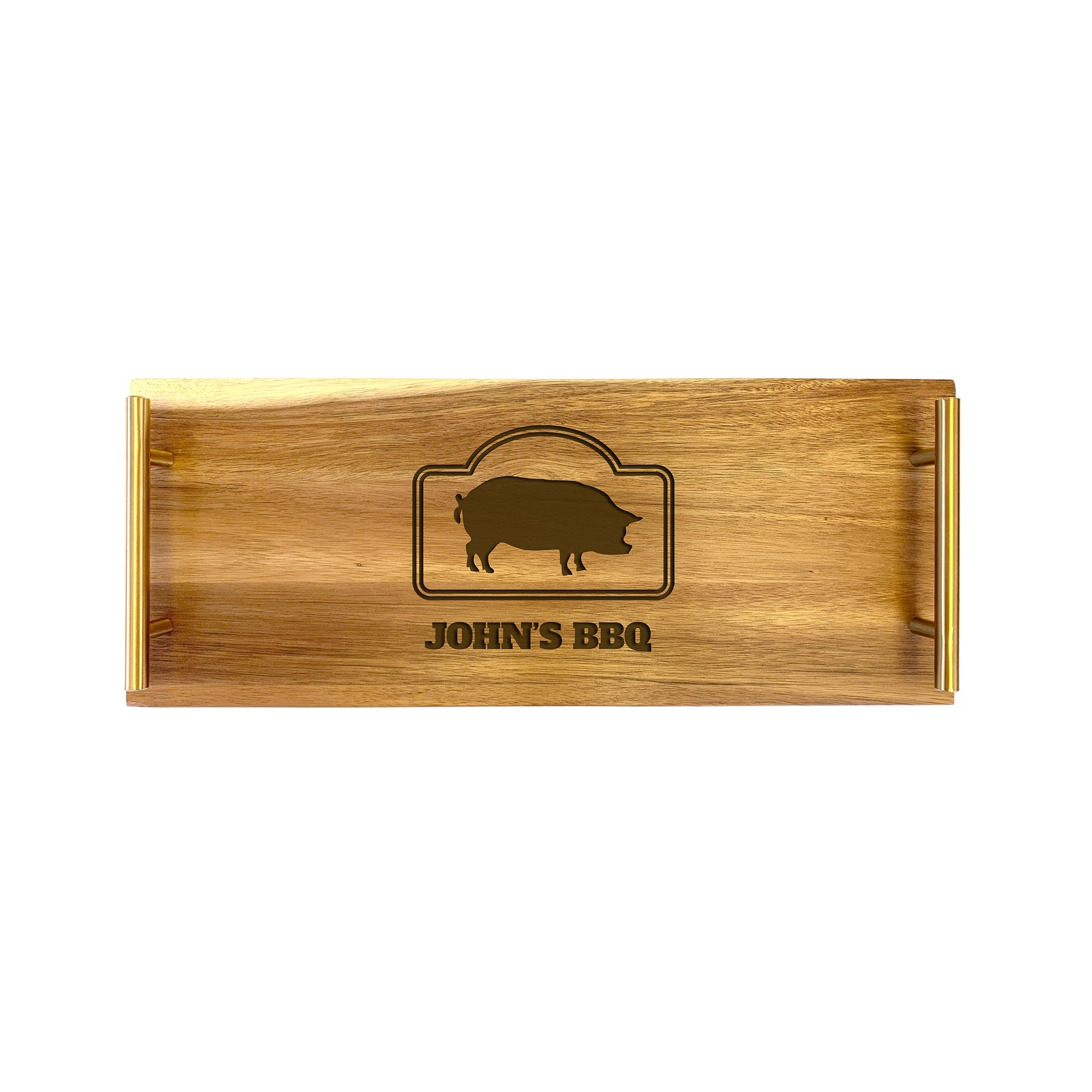 A small wooden serving tray with laser-engaved design including an silhouette of a pig and the text 'JOHN'S BBQ'.
