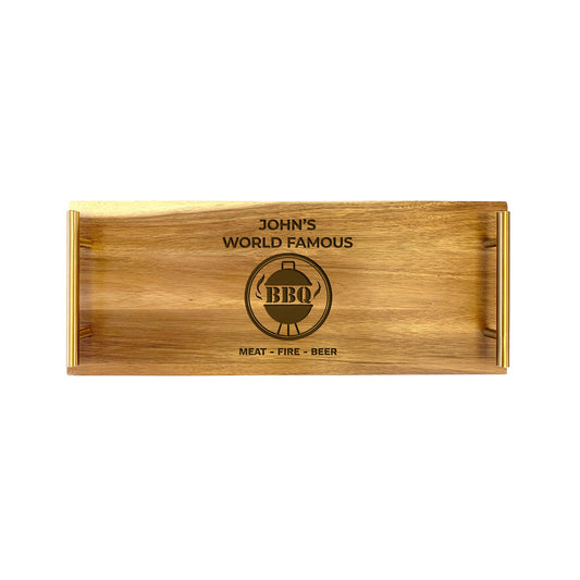 A small rectangular wooden serving tray with laser-engraved text 'John's World Famous BBQ' and additional BBQ-related graphics.