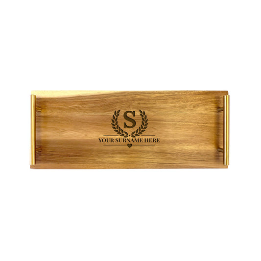 A small serving tray made from high quality acacia wood, with a personalized engraving that reads 'Your Name Here'.