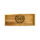 A small acacia wood serving tray with '50 years' engraved on it.