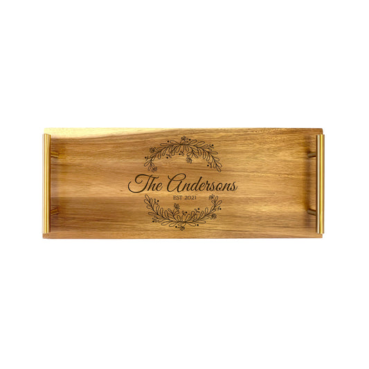 A small serving tray with a family wreath design engraved on it, made from high quality acacia wood.