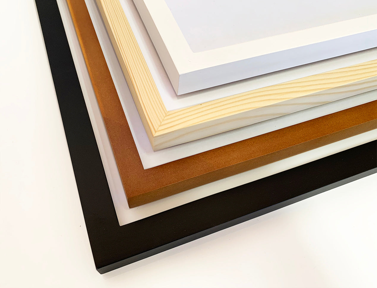 Framed Prints with many frame colours, such as white, black, light brown and dark brown