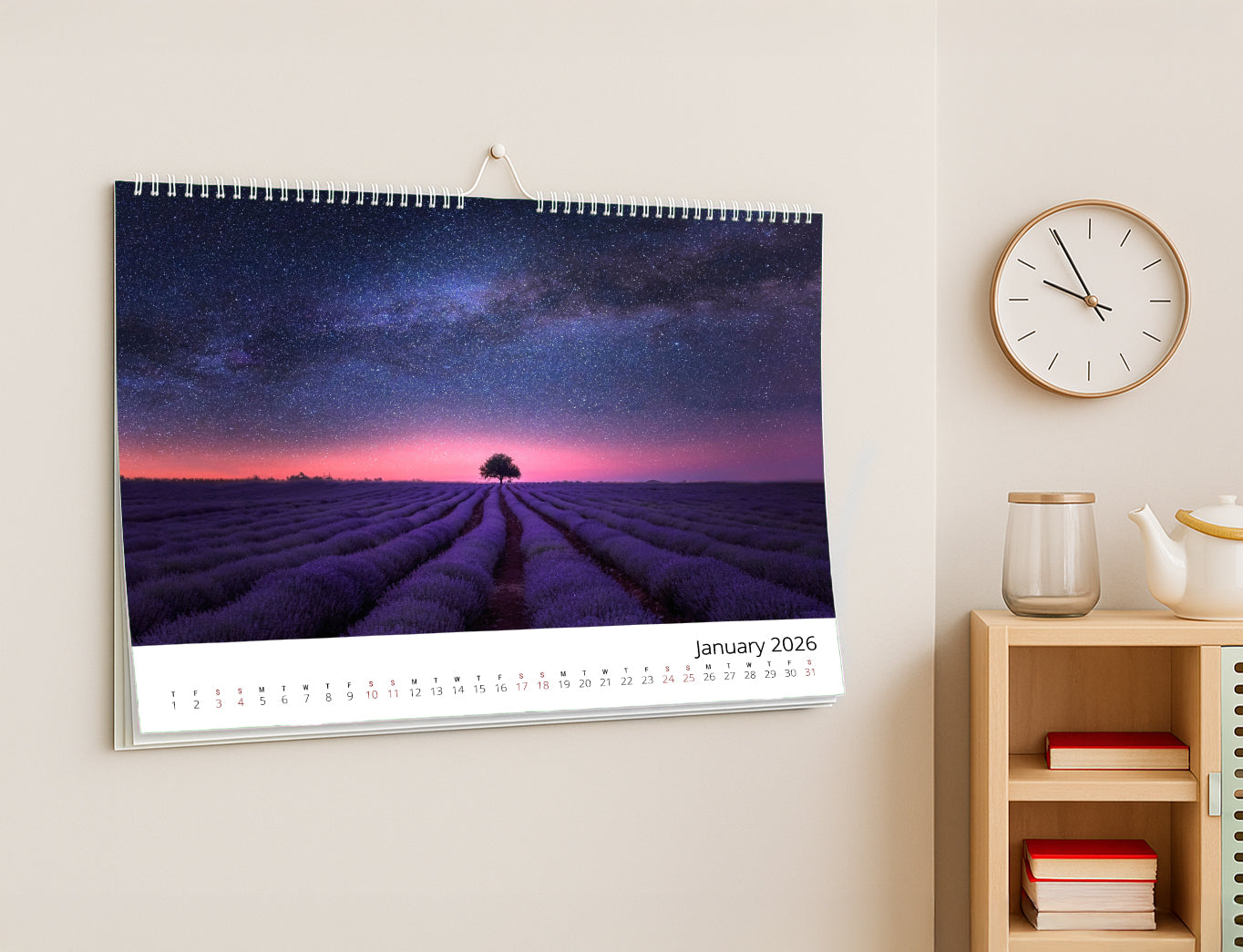 A3 landscape wall calendar with white wire binding, angled view, ideal for showcasing artwork.