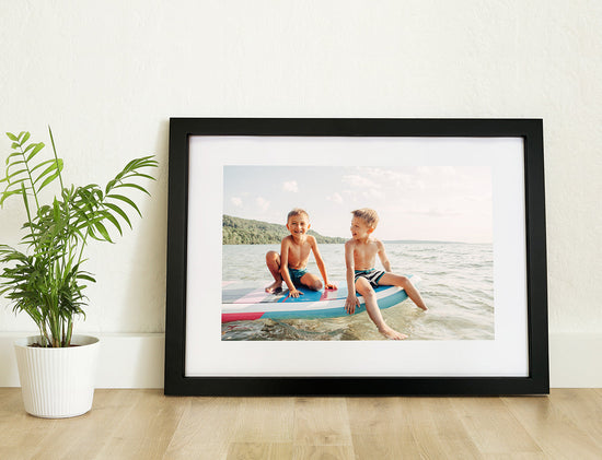 Framed Poster with black frame and family photo