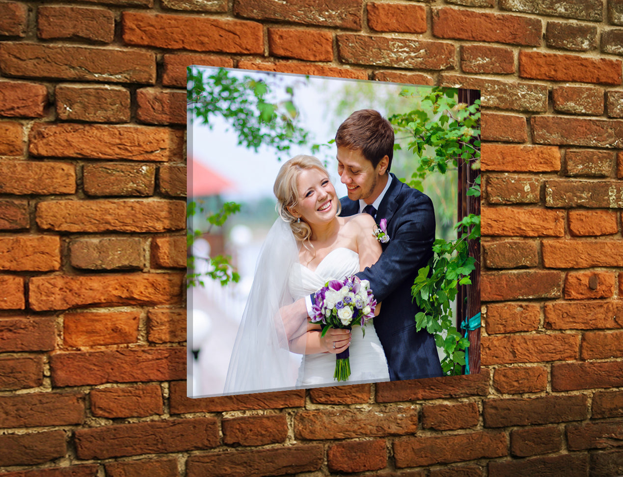 square acrylic photo prints on brick wall