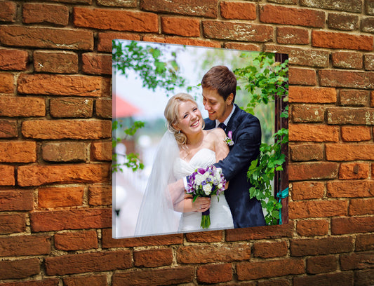 square acrylic photo prints on brick wall