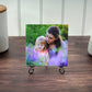 ceramic photo tile sitting on metal easel
