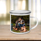 custom enamel mug sitting on table, personalised with photo of couple near camp fire.