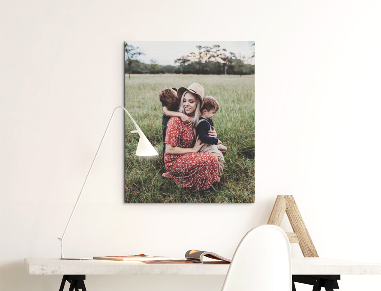 a foam board print with family photo hanging on the wall